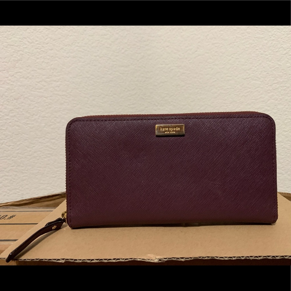 Kate Spade- Neda Wallet color: Fig Jam